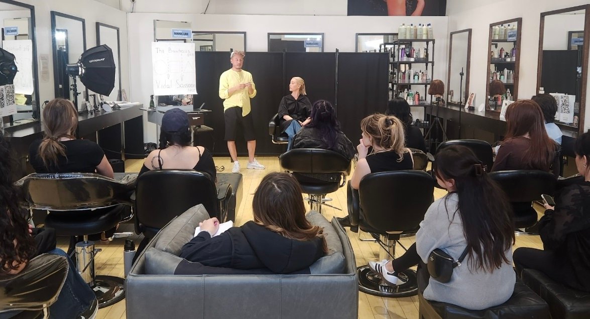 Professional hairstyling masterclass audience