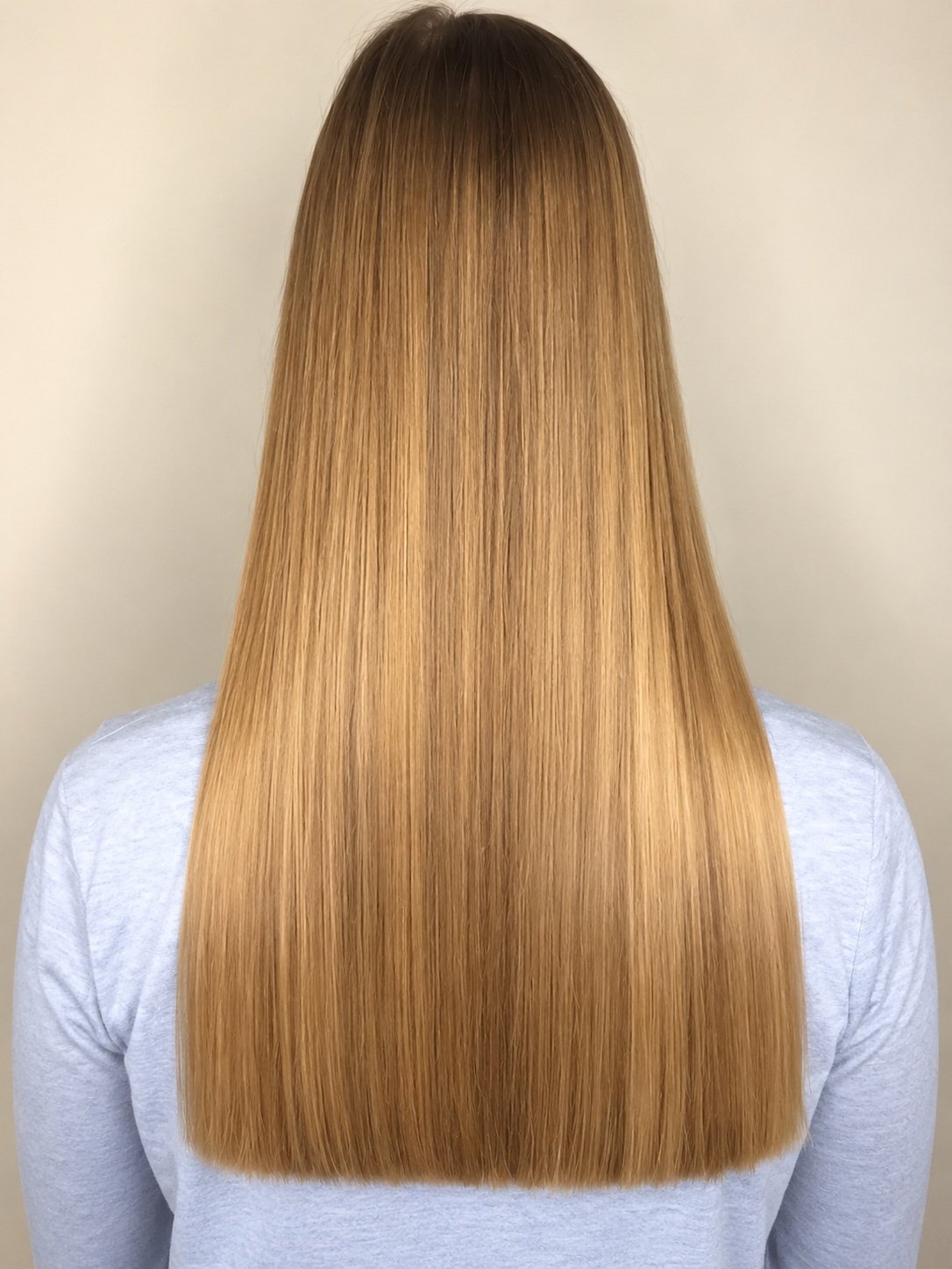 Long blonde precision haircut by Andrii Gerashchenko