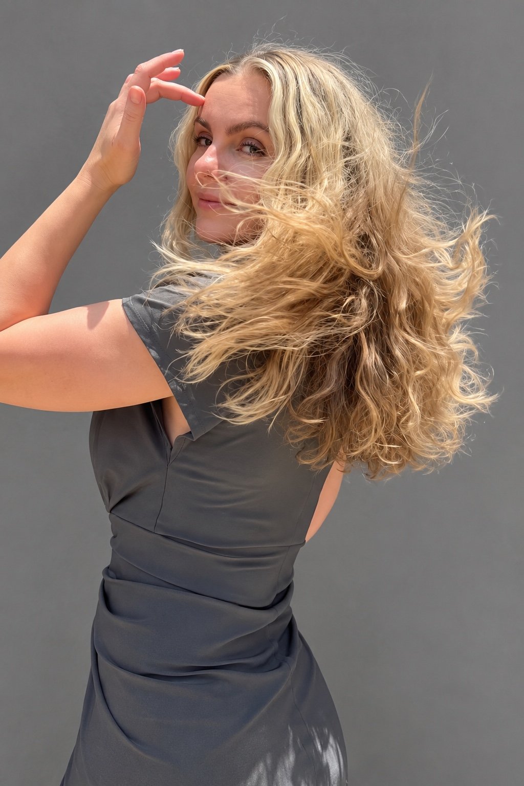 Long blonde layered haircut by Andrii Gerashchenko